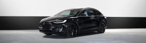tesla electric car rental x1000d in black