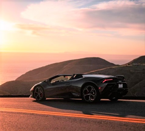 exotic car rental drive along with sunset